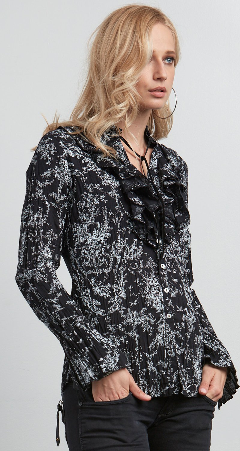 A model wears a CINO Vintage Toile Black button-down ruffle shirt.