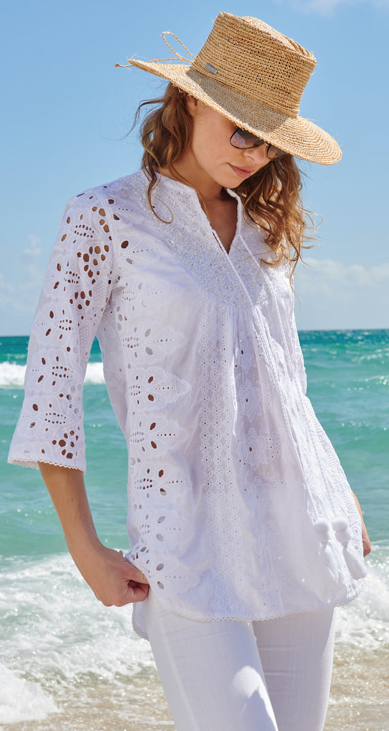 A model wears a CINO Vintage Maui White Tunic.