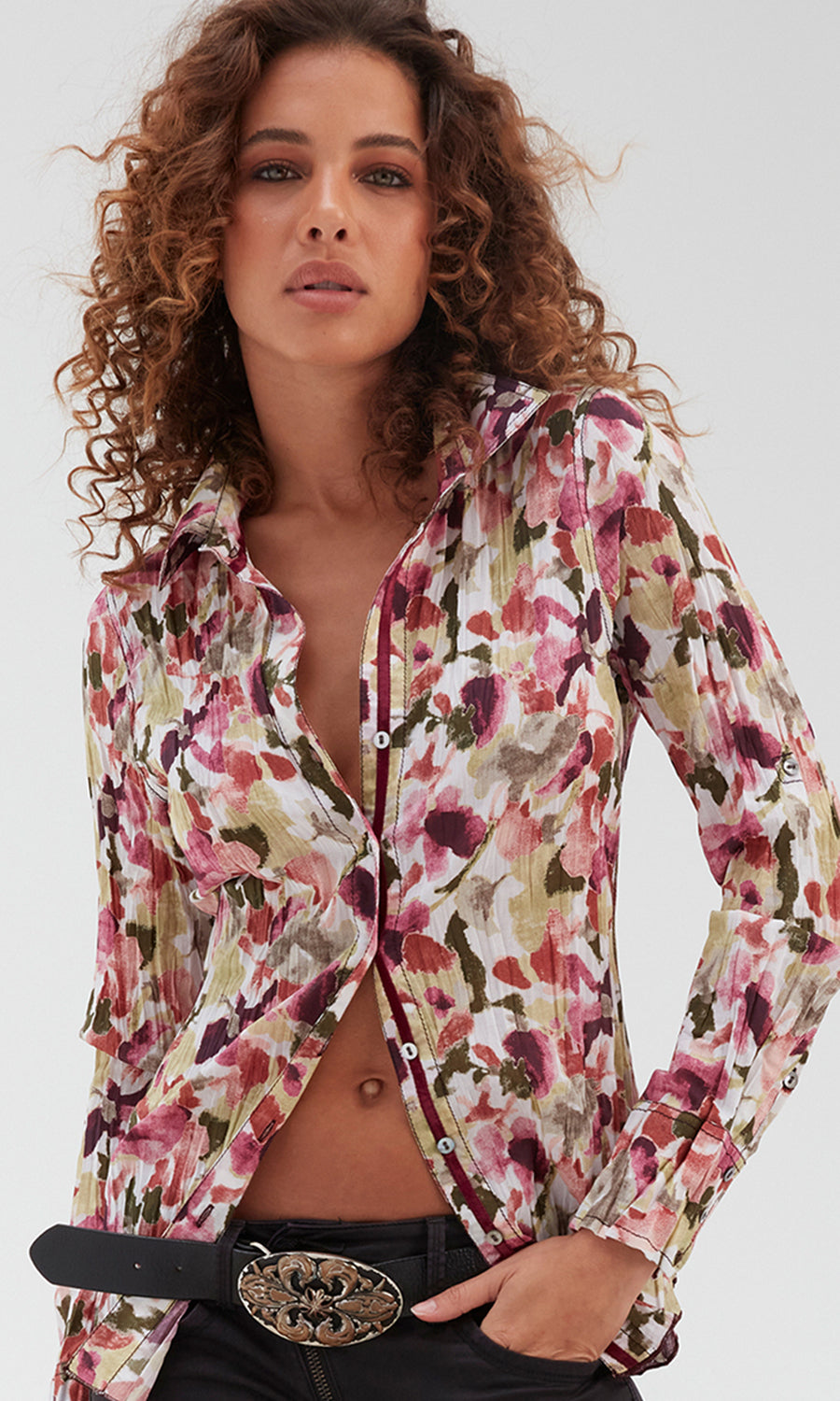 A model wears a CINO Cayenne Camden Floral button-down Shirt